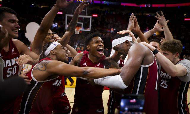 Miami Heat center Bam Adebayo (13)celebrates with teammates after he scored 83 points against the Washington Wizards, marking the second-highest single-game point total in NBA history, on Tuesday, March 10, 2026, at Kaseya Center in downtown Miami, Fla. The Miami Heat won 150-129.